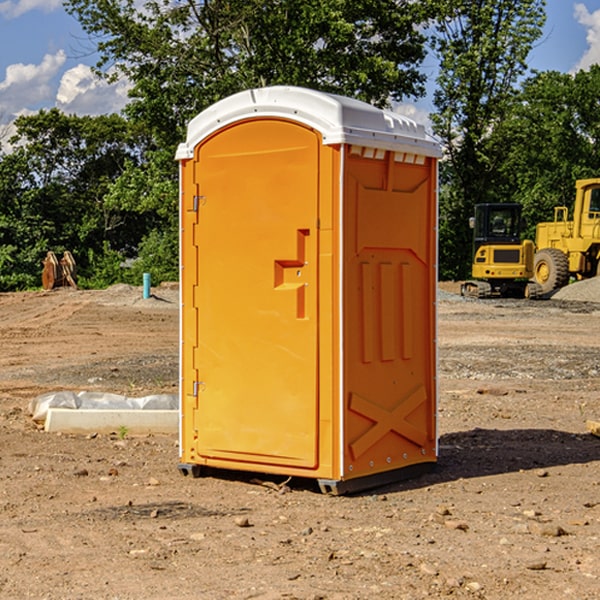 what is the cost difference between standard and deluxe porta potty rentals in Downsville